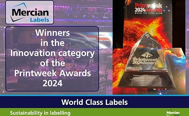 An image of a room set up for the Awards ceremony with predominantly purple lighting, waiting for the awards presentations to start – overlaid with the Mercian Labels logo and the words ‘Winners in the Innovation category at the PrintWeek Awards 2024’ in white text and a picture of the pyramid shaped, clear glass, engraved, Winners trophy to the right hand side.